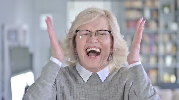 Portrait of Angry Old Woman Screaming