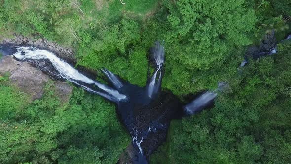 Aerial View of Waterfall in Green Rainforest