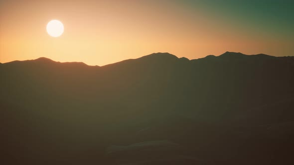 Hills with Rocks at Sunset alt