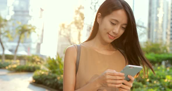 Woman using mobile phone