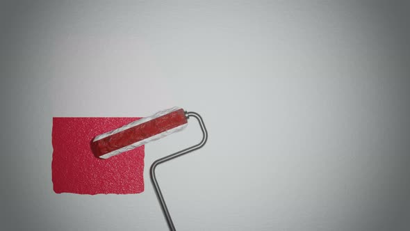 Roller paints the wall in colors of  Polish flag.