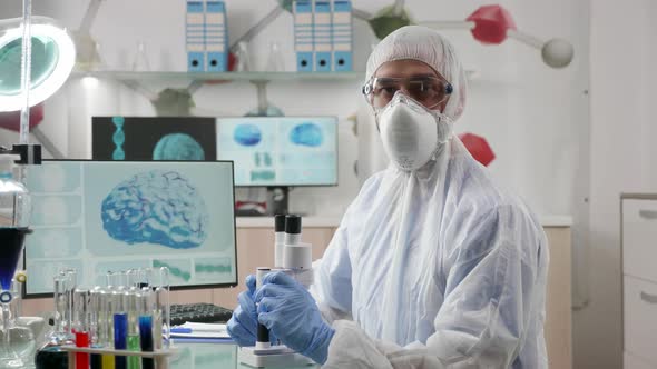 Zoom in Portrait of Chemist Researcher in His Modern Laboratory