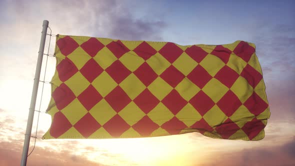 Angoumois flag, France, waving in the wind, sky and sun background