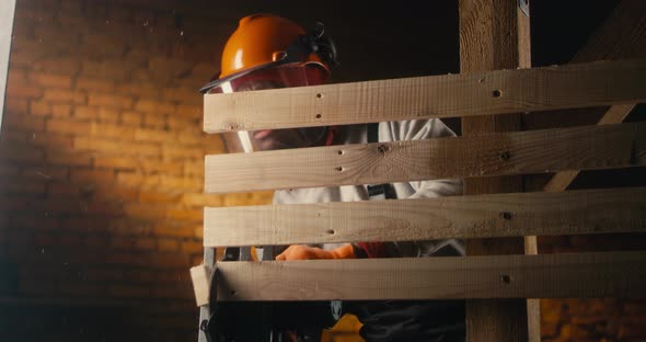 Black Joiner Cutting Lumber Boards