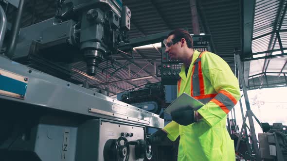 Factory Worker Warn Coworker About Safety and Give Hardhat to Him