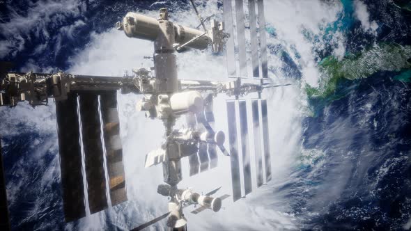 A View of the Earth and a Spaceship. ISS Is Orbiting the Earth