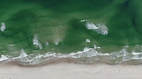 Top-down aerial view of the beach at the Baltic Sea in Poland, Europe