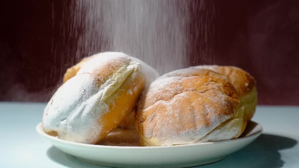 Donuts Sprinkled with Powdered Sugar