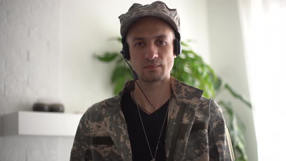 Serious Responsible Young Guy Looking at Camera Listening Order with Confidence Discipline