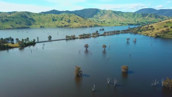 Aerial view of the Murray Valley Highway crossing the swollen floodplains of the Mitta Mitta River a