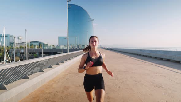 Female Jogger Running in Morning