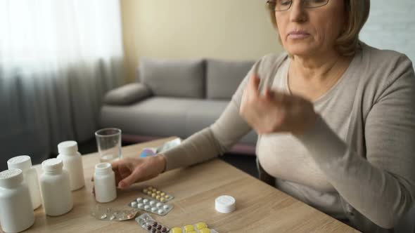 Grandmother Drinking Prescribed Pills for Heartache, Old Lady Suffering Diabetes