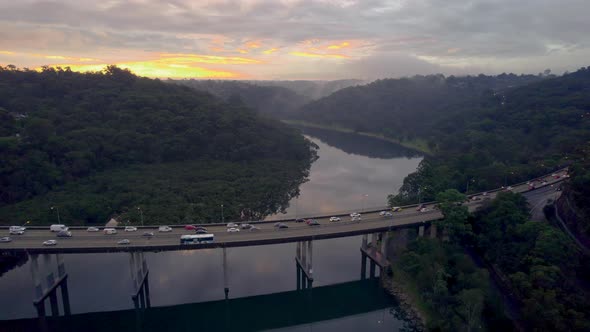 Misty Sunset Behind Bridge Traffic 2