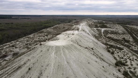 Aerial drone view phosphogypsum white mountains waste from factories