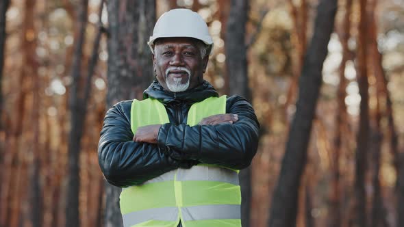 Closeup Mature Successful Experienced Engineer Forester Posing with Arms Crossed on Chest Looking at