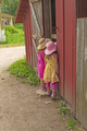 Twin Sisters Looking into a Barn - PhotoDune Item for Sale