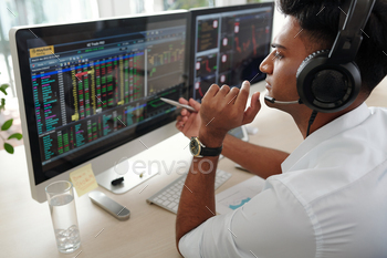 s on computer screens, investment concept