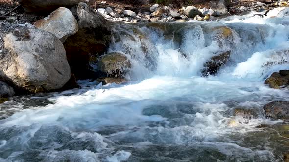 Waterfall on a mountain river aerial view 4 K Turkey Alanya