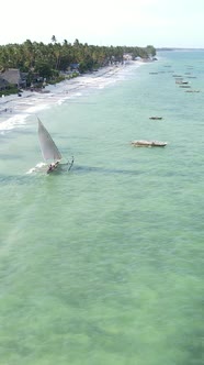 Boat Boats in the Ocean Near the Coast of Zanzibar Tanzania Slow Motion Vertical Video