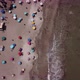 Aerial view of the beach in a hot summer morning, people having fun, enjoying the summer adventures. - VideoHive Item for Sale