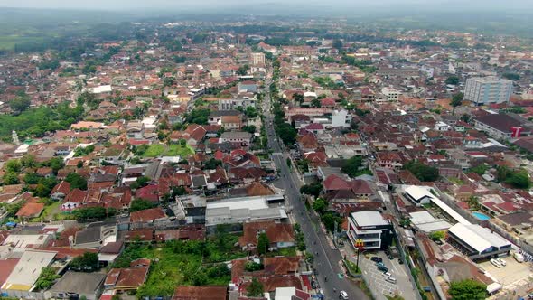 Magelang old city in Central Java, Indonesia. Aerial forward drone view