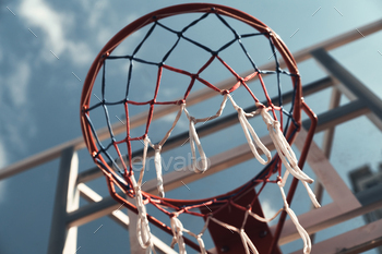 Best game ever. Shot of basketball hoop with sky in the background outdoors