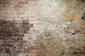 Old brick and cement wall with black burned part - PhotoDune Item for Sale