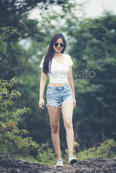 portrait of young beautiful girl woman happy with nature, against background of mountain and forest / Photodune, Misc