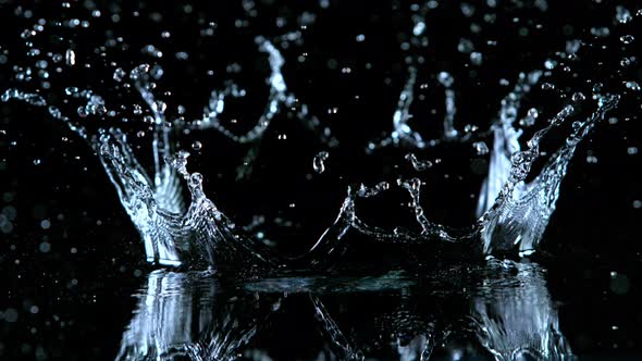 Super Slow Motion Shot of Water Crown Splash at 1000Fps Isolated on Black Background