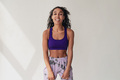attractive black african american woman in stylish hipster fitness outfit on isolated background - PhotoDune Item for Sale