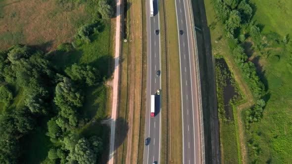 Aerial Vertical Shot. Cars Driving By the Road. Traffic on the Highway.  Footage From Drone.