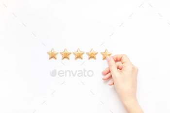 5 stars, best excellent services rating with woman hand for satisfaction isolated on white background. Top view, copy space for your text
