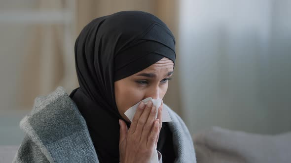 Close Up Sick Upset Young Girl in Hijab Sneeze Wipe Nose with Paper Napkin Sad Unhealthy Muslim