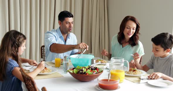 Family Having a Spaghetti Dinner Together