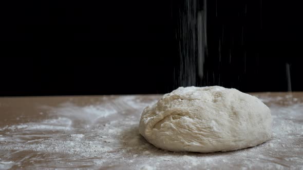 Cooking Bread and Sprinkling with Flour