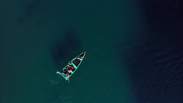 AERIAL: Lago De Camecuaro, Boat, Tangancicuaro, Mexico (Steady Down)