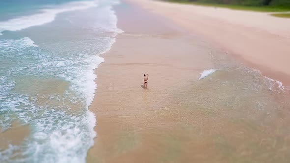 Asian Woman Feet Standing Barefoot Beach at Endless Ocean Seaside Leaving Footprints in Sand