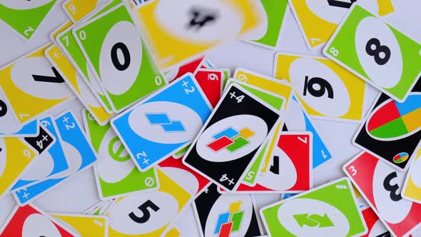 Playing Cards on a White Background UNO Game Cards That Fall Randomly Top View