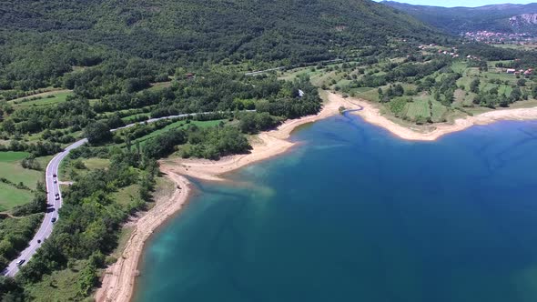 Flying above beautiful landscape of artificial lake of Peruca, Croatia