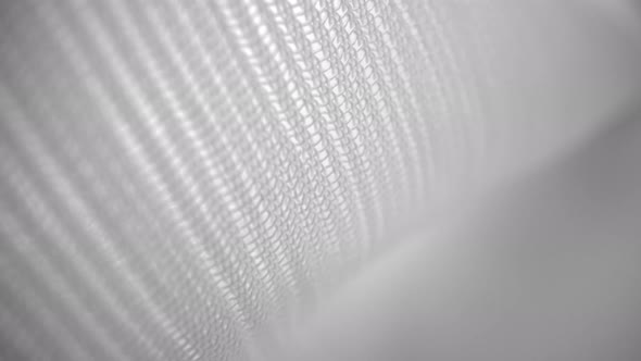 Shiny Net Cloth Flowing Texture Dolly Shot in Close Up View Macro