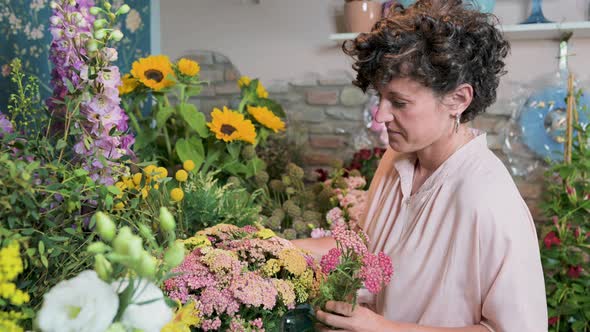Florist working in flower shop