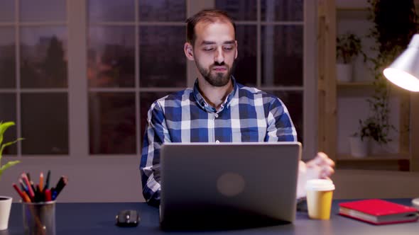 Bearded Entrepreneur Taking a Sip of Coffee