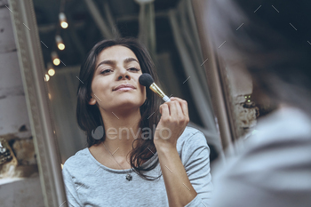 n putting on some make-up while spending time at home
