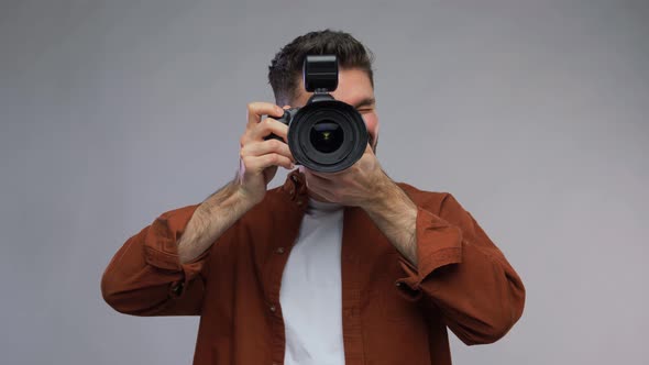 Portrait of Male Photographer with Digital Camera