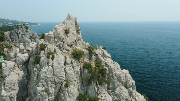 Aerial Fly Around Krylo Lebedya Swan Wing with Diva Rock Revealing Rock Diva and Black Sea in