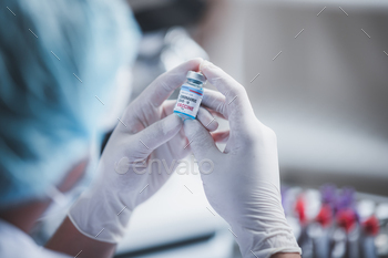 fight against COVID-19, coronavirus vaccine research in hospital laboratory / Photodune, Misc