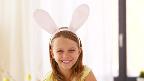 Happy Girl Wearing Easter Bunny Ears Headband