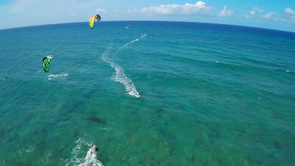 Aerial view of a man kitesurfing in Hawaii