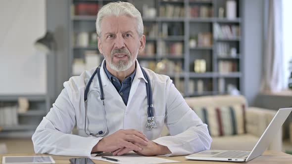 Senior Old Doctor Doing Consultation with Patient, Video Chat