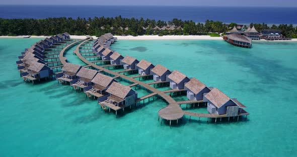 Natural overhead copy space shot of a sunshine white sandy paradise beach and blue ocean background 